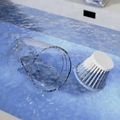 Clear glass and white scrubber on a blue textured surface | Origin Zero